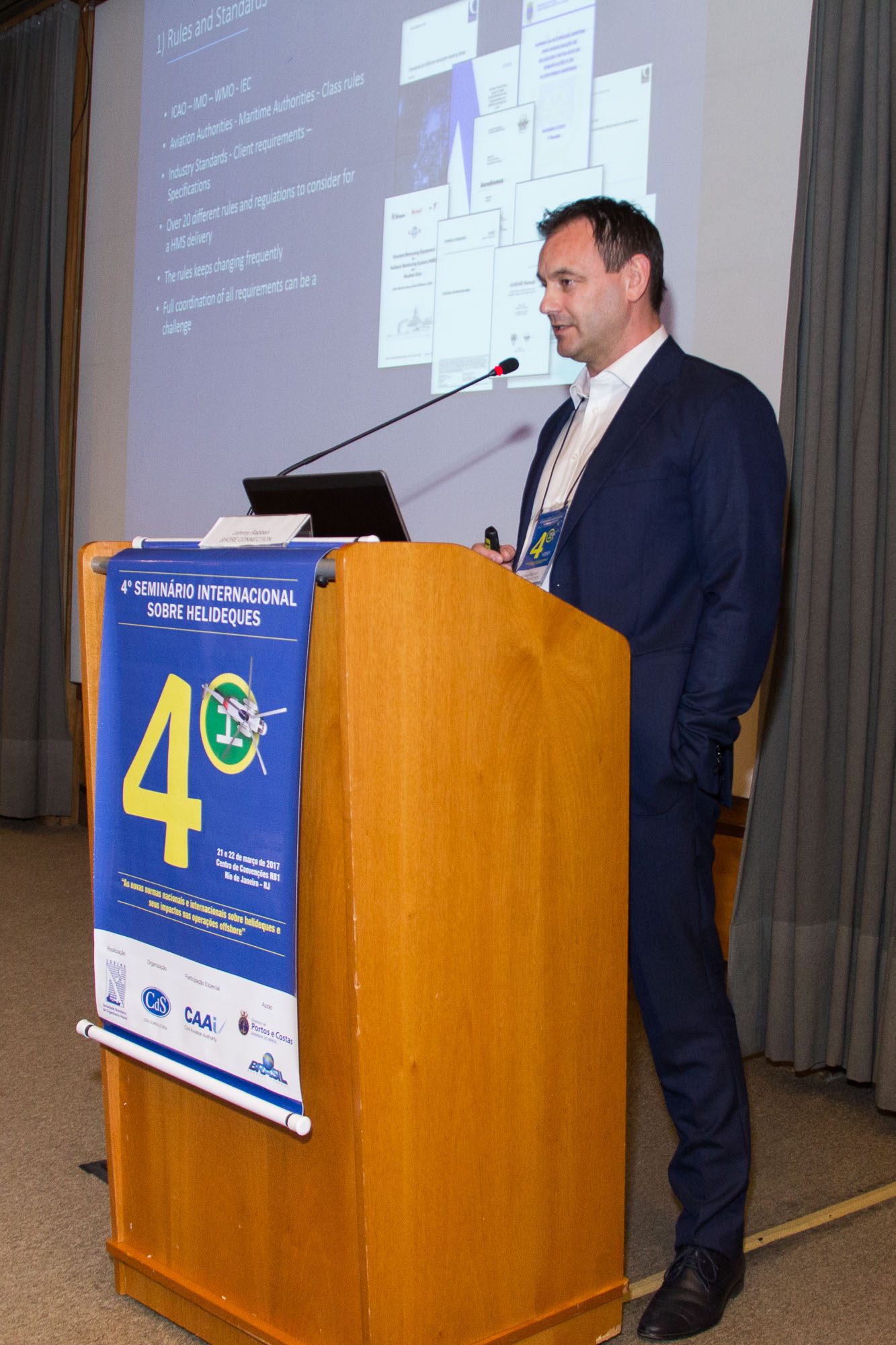 a man standing at a podium