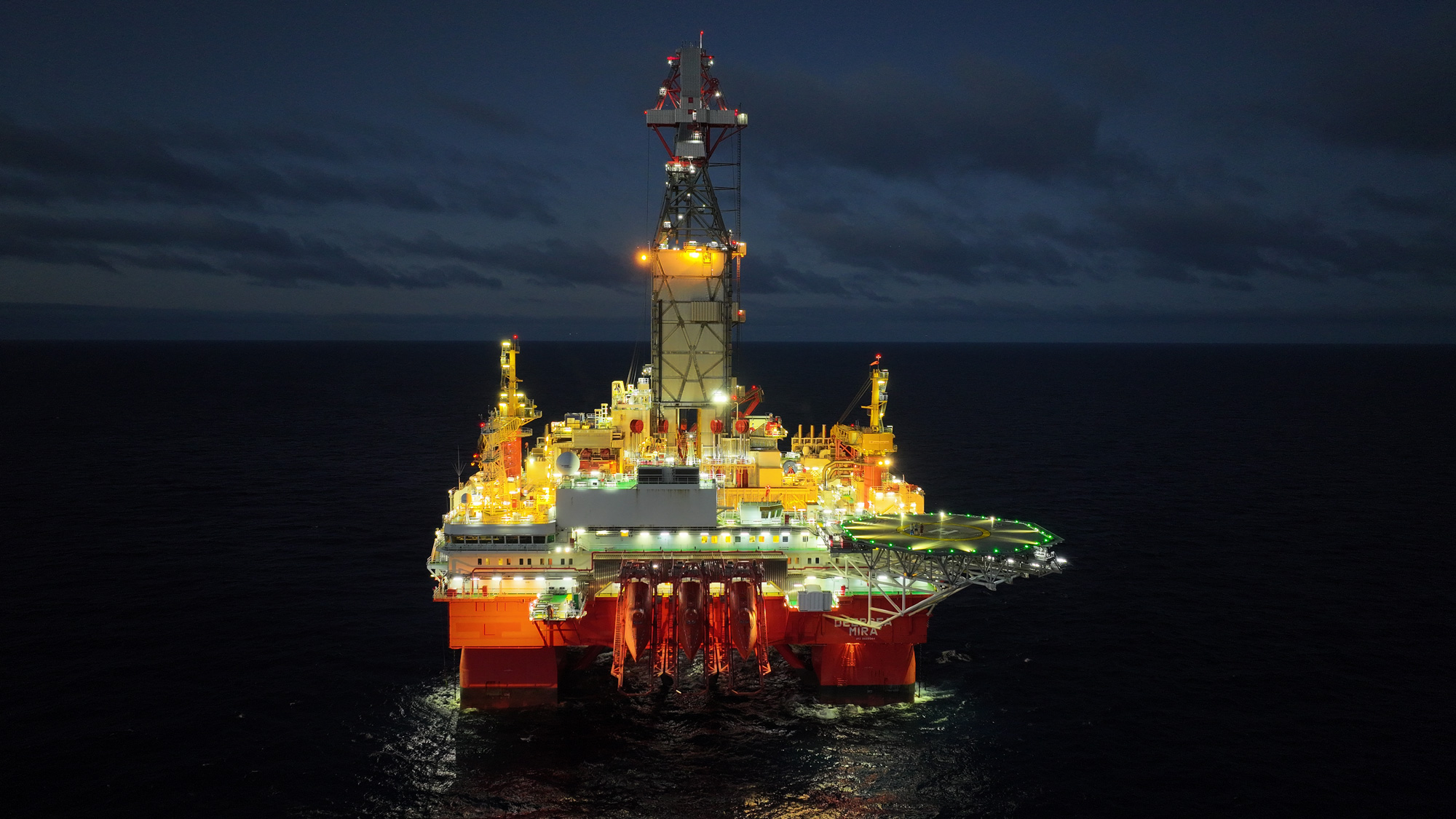 a oil rig in the water