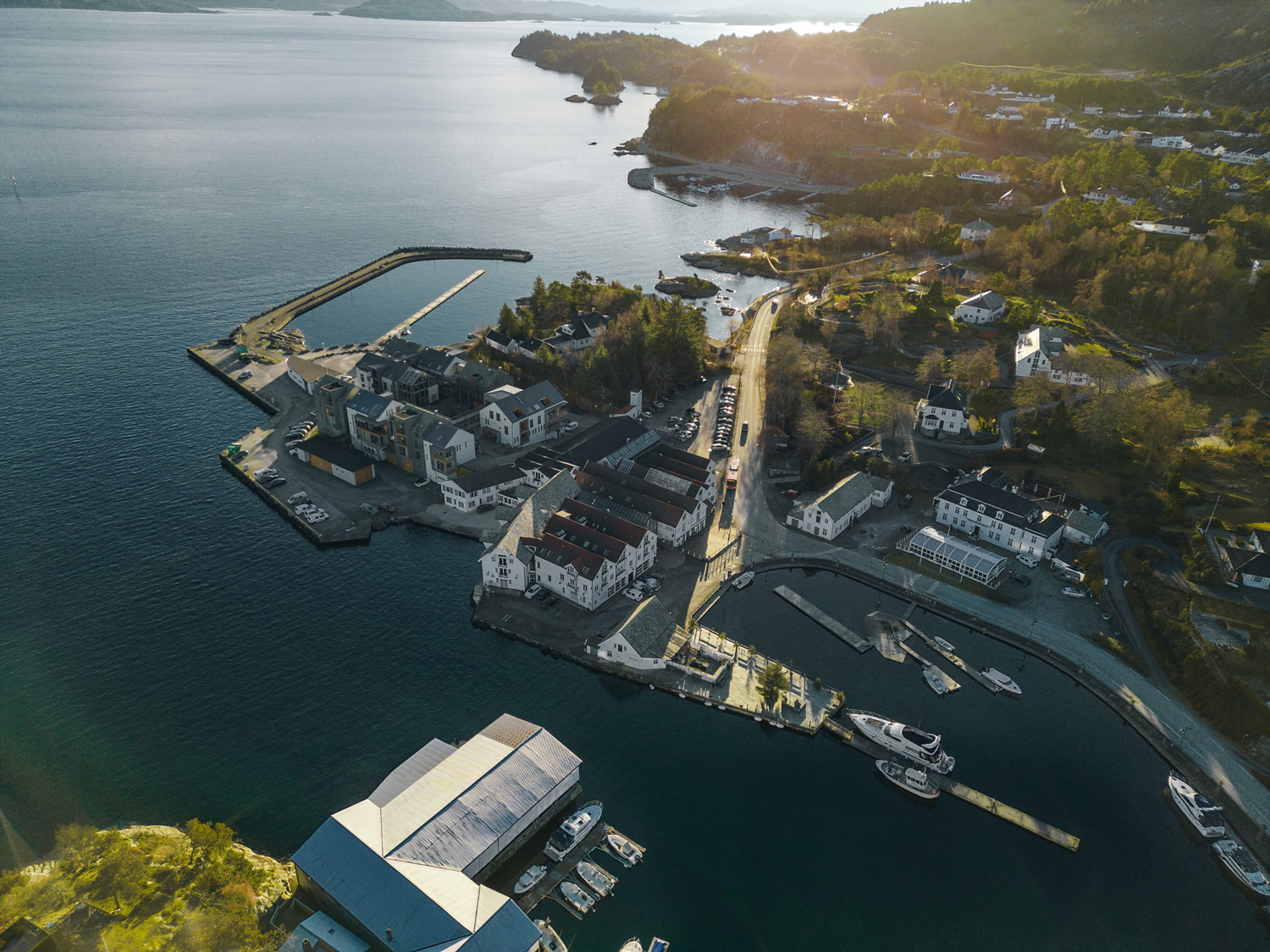 a aerial view of a small town on a lake